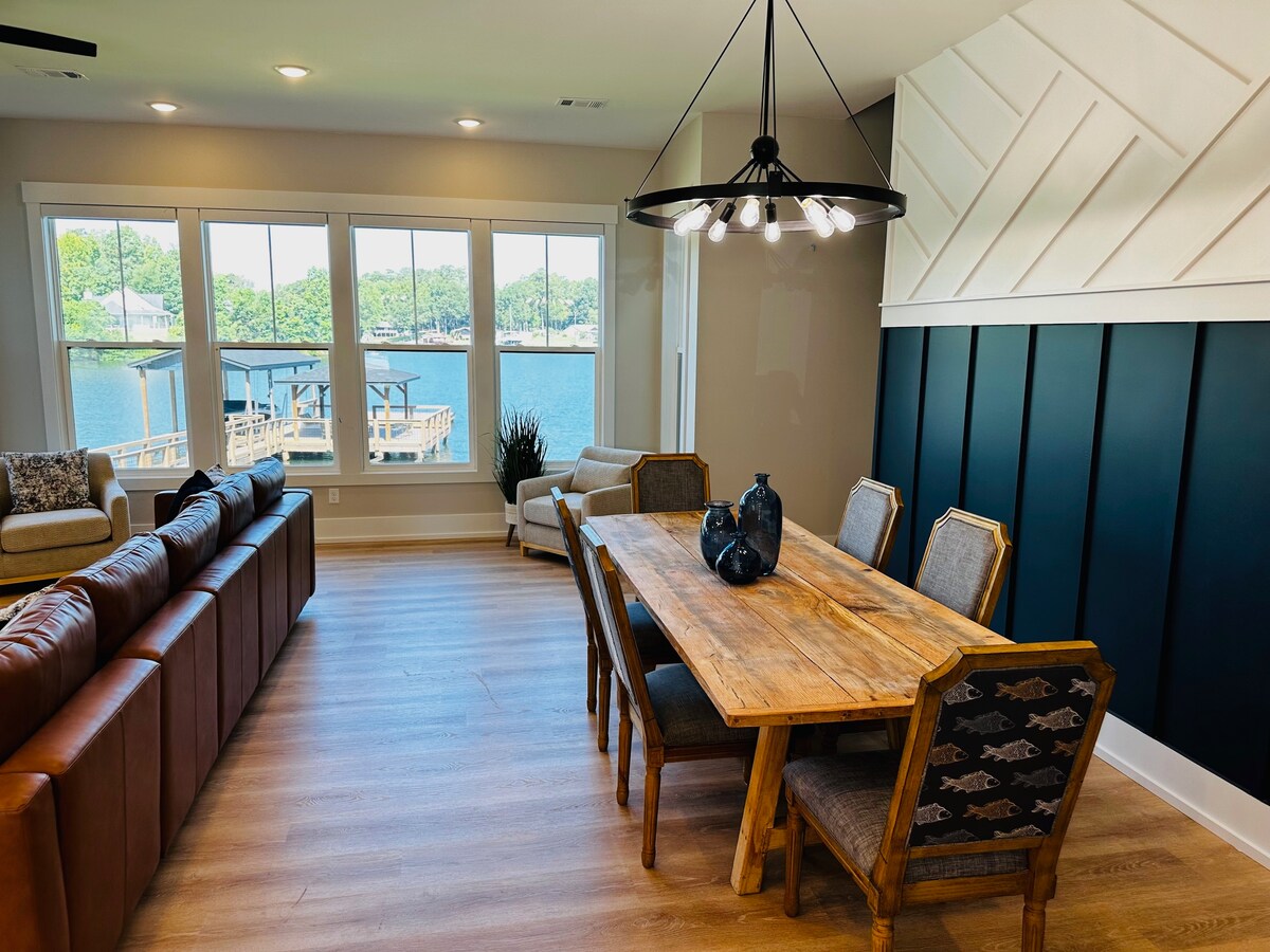 Dining table and lake view through the great-room windows